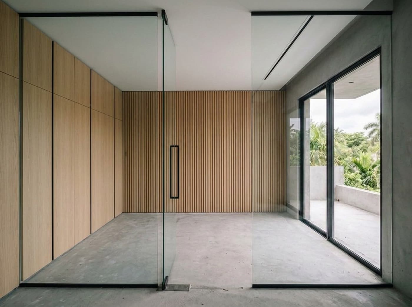 Concept visualization: the same room with full-height oak millwork along the left wall and a slat wall panel behind